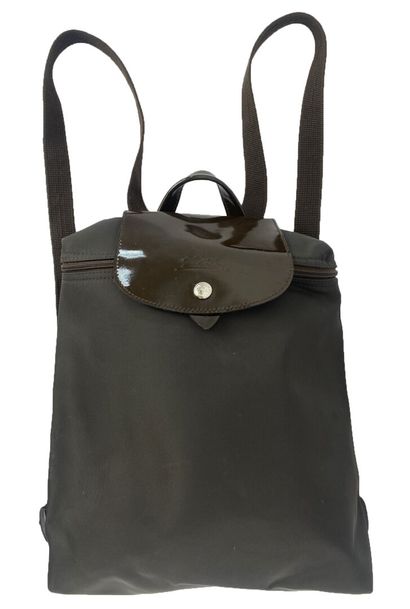 LONGCHAMP
Set of fabric leather goods, including...