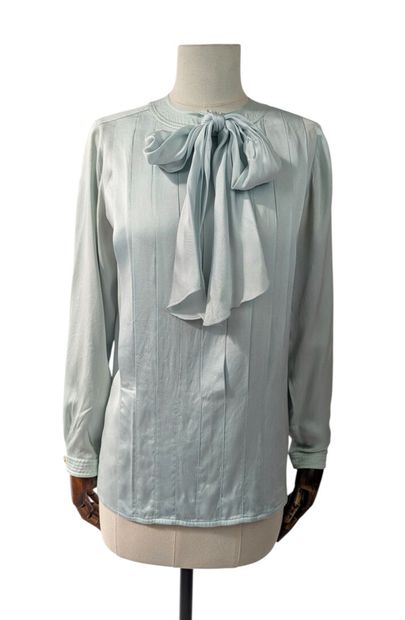 CHANEL - Boutique
Pastel blue silk blouse...