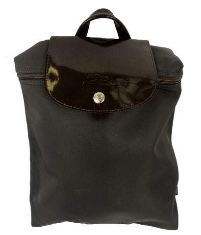 LONGCHAMP
Set of fabric leather goods, including...