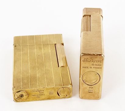 ST DUPONT
Two gold-plated metal lighters...
