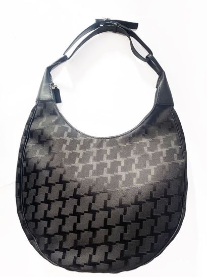 LANCEL
Shoulder bag made of canvas with a...