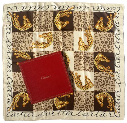 CARTIER
Silk square with panther motif.
65...