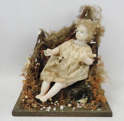 ENFANT Jésus en cire dans un décor, sous...