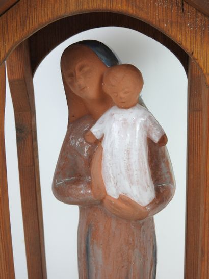 VIERGE à l'enfant en terre cuite vernissée,...