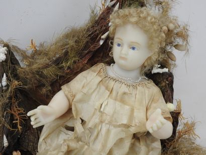 ENFANT Jésus en cire dans un décor, sous...