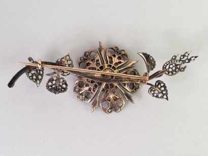 18K (750°/°°) yellow gold and silver (800°/°°)...