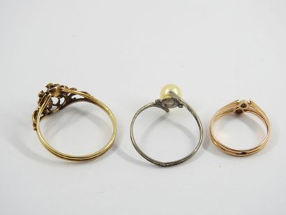 REUNION of two yellow gold rings and one...