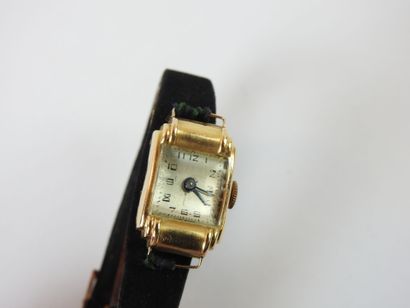Woman's watch Tank 18K gold. Gross weight...