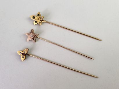 Lot of three 18K (750°/°°) yellow gold tie...