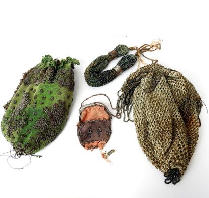 FOUR BOURSES or small beaded bags. 19th century....