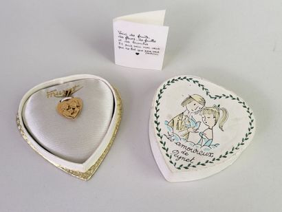 Heart-shaped medal in 18K yellow gold (750°/°°)...
