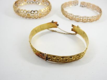 THREE RIGID BRACELETS in gold 750 thousandth....
