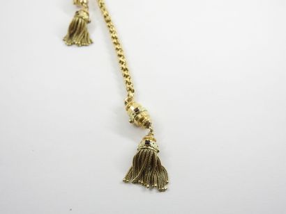 Tie necklace in yellow gold decorated with...