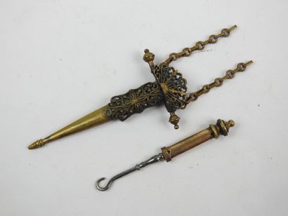 Miniature gilded metal ring forming a coin...