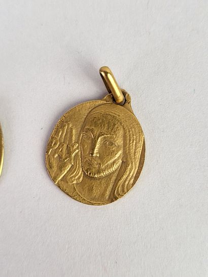 A. AUGIS.
Lot of 2 religious medals in yellow...