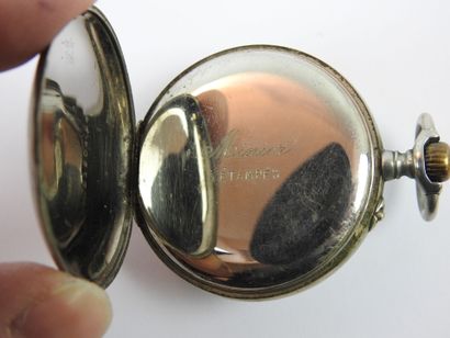 Metal pocket watch by Minier in Étampes....