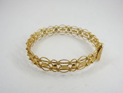 RIGID BRACELET in 14K yellow gold, clasp...