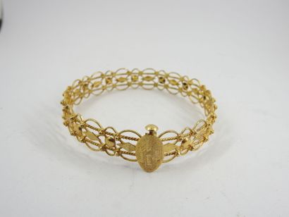 RIGID BRACELET in 14K yellow gold, clasp...