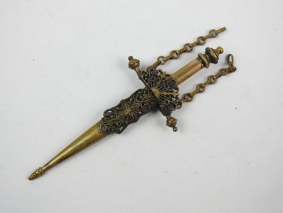 Miniature gilded metal ring forming a coin...