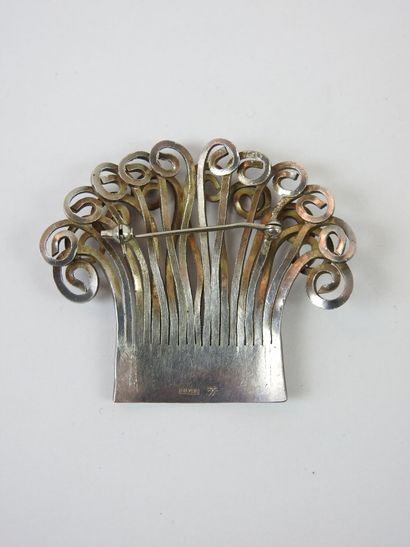 Spout in hammered and carved silver. Foreign...