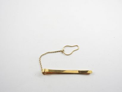 Tie pin in gold 750 thousandth. Weight :...