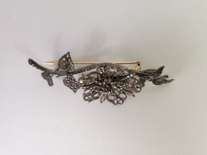 18K (750°/°°) yellow gold and silver (800°/°°)...