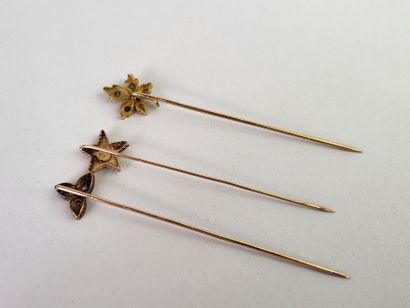 Lot of three 18K (750°/°°) yellow gold tie...