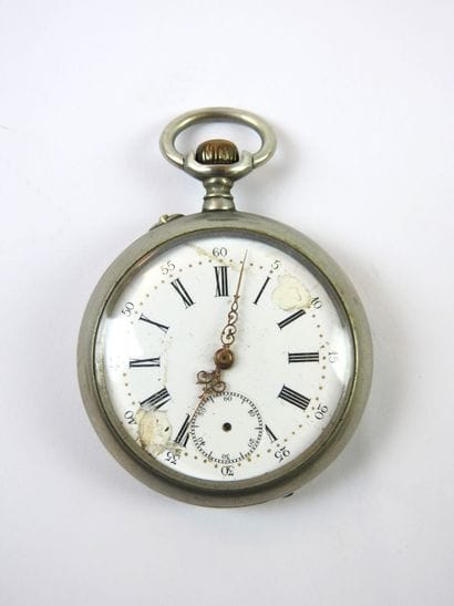 Metal pocket watch by Minier in Étampes....