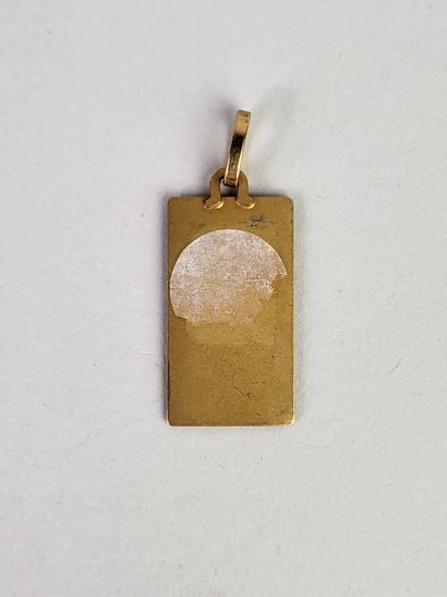 Rectangular religious medal chiseled in 18K...