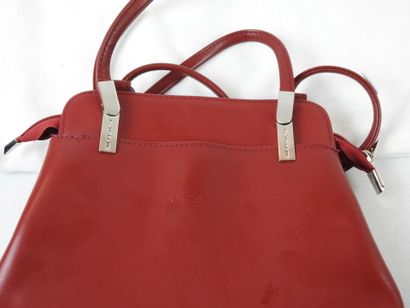 LANCASTER: Backpack color red. With dust-bag....