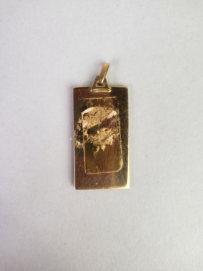 Rectangular religious medal in 18K yellow...