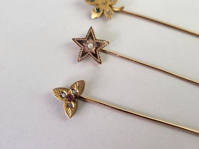 Lot of three 18K (750°/°°) yellow gold tie...