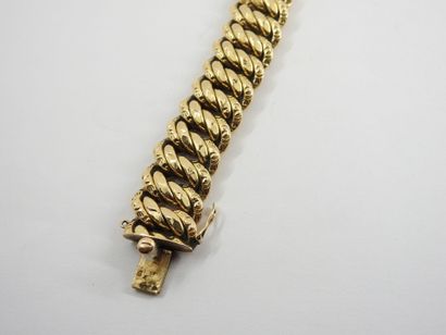 BRACELET Gourmette in yellow gold 750 thousandth....