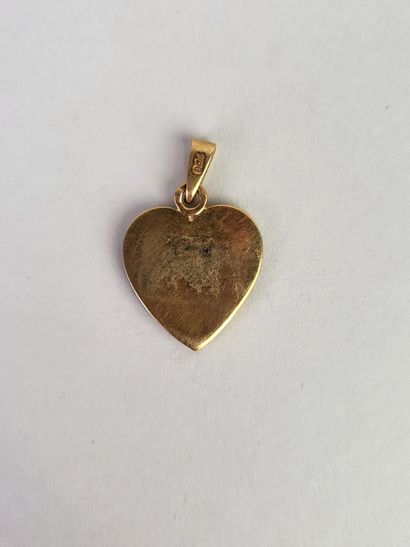 Heart-shaped medal in 18K yellow gold (750°/°°)...
