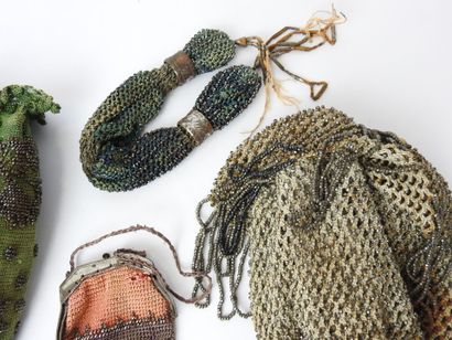 FOUR BOURSES or small beaded bags. 19th century....