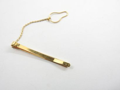 Tie pin in gold 750 thousandth. Weight :...