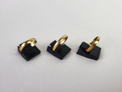 Lot of 3 wedding rings in 18K yellow gold...