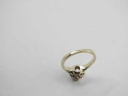 White gold solitaire ring set with a central...