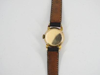 OMEGA: Women's watch with gold metal case...