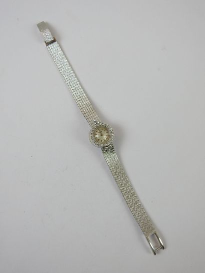 OMEGA: Ladies' wristwatch in platinum. Gross...