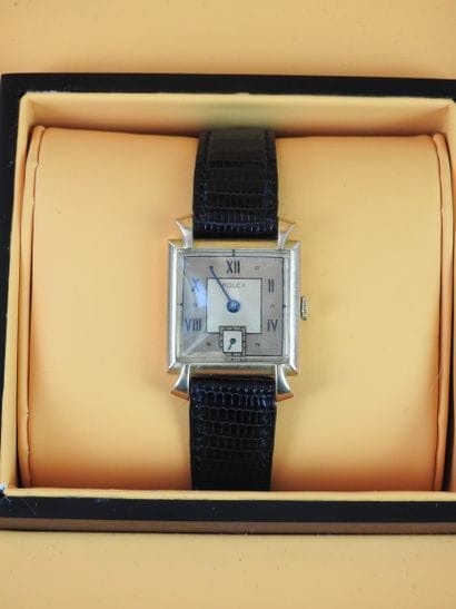 ROLEX: Man's watch, square case in yellow...
