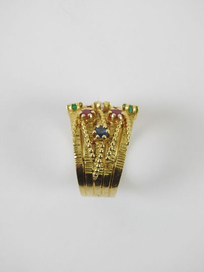 Yellow gold ring made of five rings decorated...