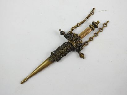 Miniature gilded metal ring forming a coin...
