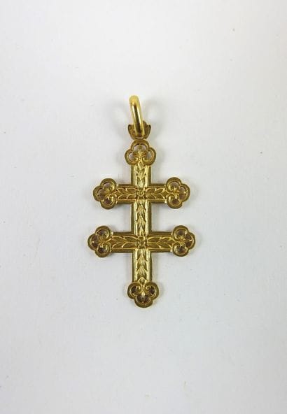 PENDANT Cross in yellow gold 750 thousandths....