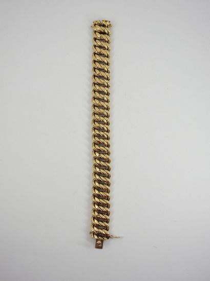 BRACELET Gourmette in yellow gold 750 thousandth....