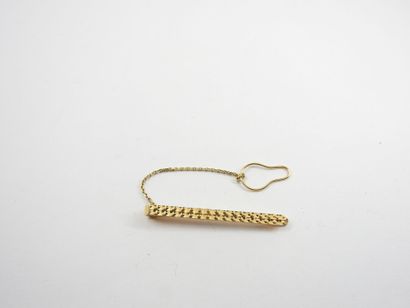 Tie pin in gold 750 thousandth. Weight :...
