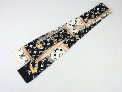 LOUIS VUITTON-PARIS: Black silk twilly. Wear...