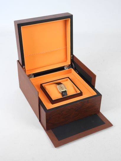 ROLEX: Man's watch, square case in yellow...