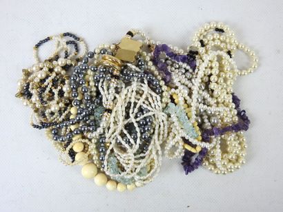 LOT of fancy pearl necklaces. 