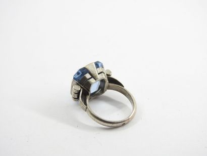 Silver ring decorated with a blue stone....